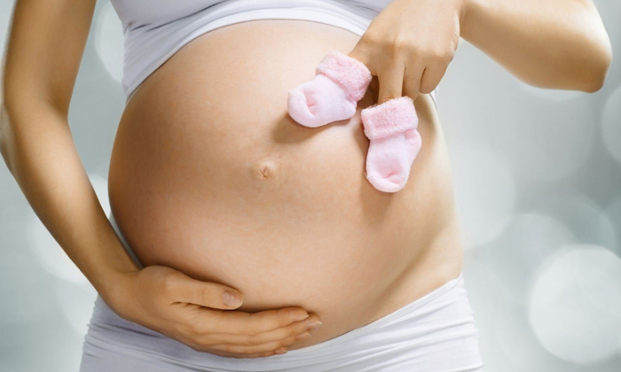 Беременная девушка