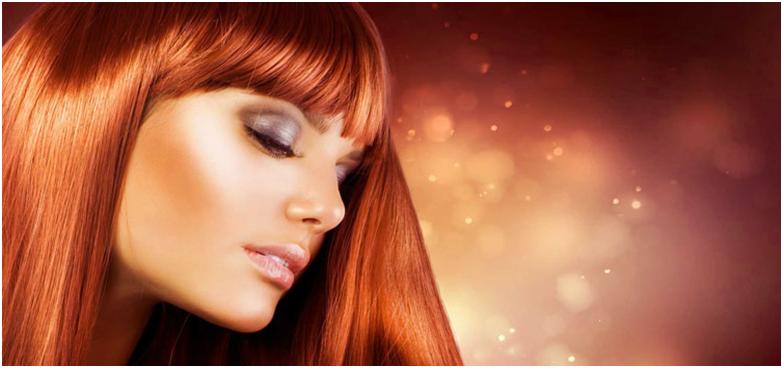 Рыжеволосая девушка с закрытыми глазами